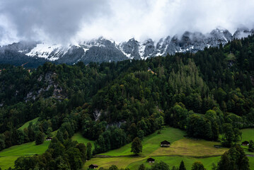 Houses below the mountains