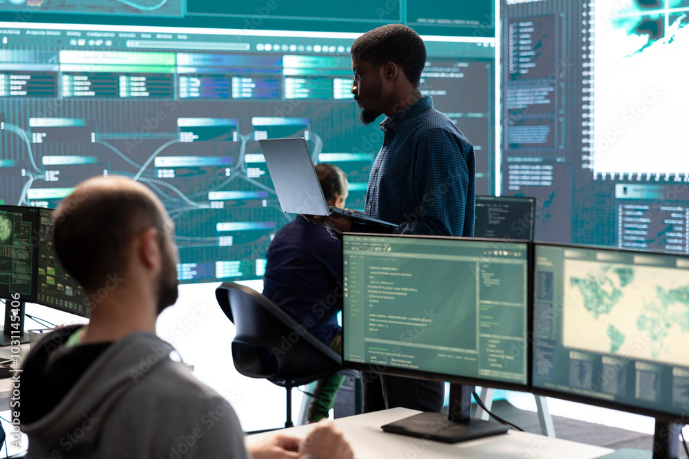 Poster hackers group using ransomware and phishing tactics to compromise computer networks and gather intel