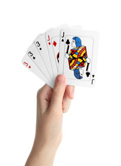 Poker game. Woman holding playing cards on white background, closeup