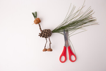step in creative process, DIY, autumn craft, handmade bird crafted from pine cones and twigs,...