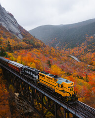 North Conway, New Hampshire - October 14, 2021: Passing Conway Train on Tracks Fall Foliage Scenic...