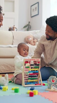 Family, daughter and toys for learning in home, abacus and together for math development. Black people, girl and support for counting on living room floor, love and games with toddler for education