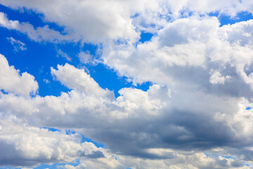 Fototapeta premium The sky is blue with a few clouds scattered throughout, background