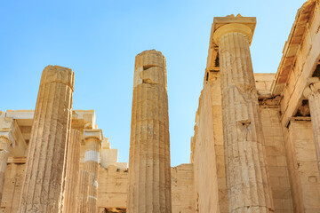 A row of tall columns, possibly from an ancient building