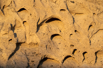 Weathered wall texture near the beach.