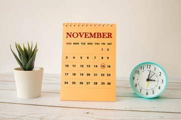 15 November on wooden grey cubes. Calendar cube date 15 November.