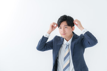 ヘアセットをするビジネスマン