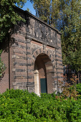 Bergpoort (former city gate of Deventer, 1619) and Herepoort (former city gate of Groningen, 1621) were moved to garden of Amsterdam Rijksmuseum and combined into one gate. AMSTERDAM, The NETHERLANDS.