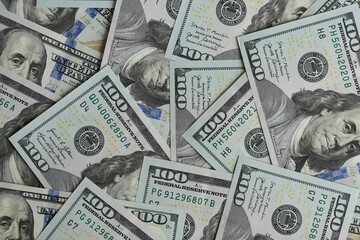 Big amount of american USD hunderd dollar bills banknotes close up