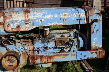 Abandoned rusty tractor detail