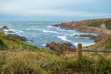 Rocky coastline and rough sea in La Coruña, Spain