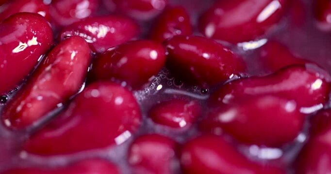 red canned beans in close-up, open canned red beans in brine