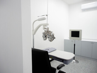 Ophthalmologist healthcare medical people optometry medical exam eye eyesight doctor human body part patient human instrument len glaucoma american hispanic ethnicity hospital indoor room nurse clinic