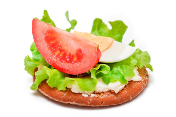 Crispy Cracker Sandwich with Tomato, Lettuce and Egg - Isolated on White. Easy Breakfast. Diet Food. Quick and Healthy Sandwiches. Crispbread with Tasty Filling - Isolation