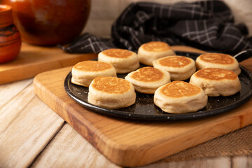 Gorditas de Nata. Cream Gorditas, Mexican street snack, is an easy recipe made with wheat flour, cream, sugar and cinnamon, sweet bread similar in shape to an English muffin, eaten as a dessert.