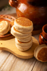Gorditas de Nata. Cream Gorditas, Mexican street snack, is an easy recipe made with wheat flour, cream, sugar and cinnamon, sweet bread similar in shape to an English muffin, eaten as a dessert.