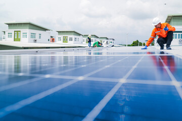 engineer man inspects construction of solar cell panel or photovoltaic cell by electronic device....