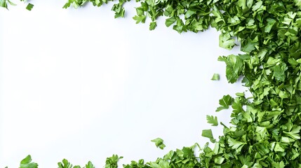 chopped parsley leaves isolated on white background with copy space above.