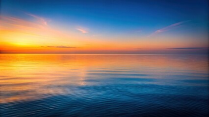 Fototapeta premium Serene ocean horizon at twilight with warm color gradient reflected on water surface , ocean, horizon, twilight, warm colors