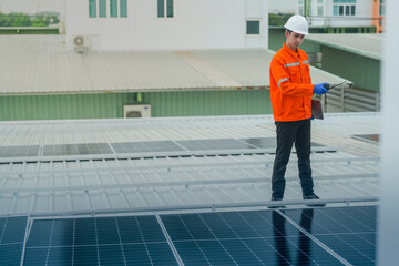 engineer man inspects construction of solar cell panel or photovoltaic cell by electronic device....