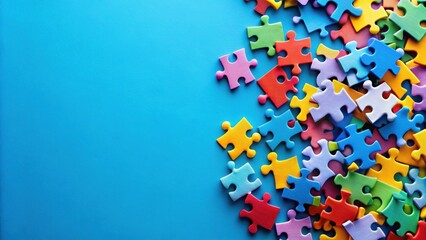 Assorted colorful puzzle pieces on blue background, jigsaw, scatter, colorful, pattern, game, toys