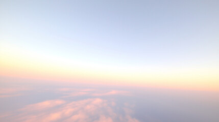 a vast expanse of sky stretches out with a soft gradient from pale blue at the horizon to a deep, rich indigo at its zenith