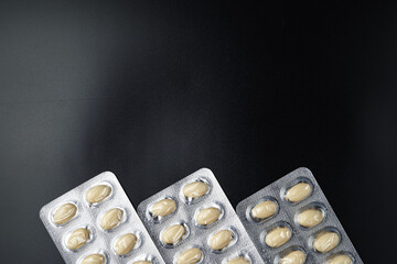 Oil filled blister pack white softgel capsules of food supplements, fish oil, omega 3, vitamin DHA
