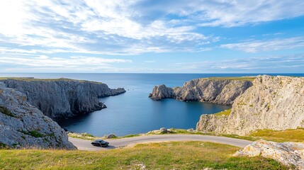 A stunning scenic view of a winding coastal road surrounded by cliffs and vibrant blue ocean,...