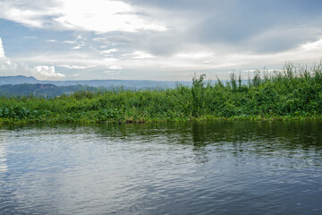 Laguna lake area, Philippines, with mountains from Antipolo in the distance.