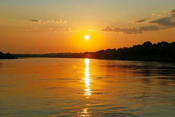 Obraz premium Sunset at the river coast. Sunset on the beach of the Baltic Sea