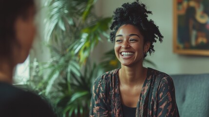 Client experiences a breakthrough moment in therapy session, smiling with relief while therapist provides support in a calming environment