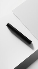 Minimalist black mascara tube on geometric white surface for cosmetic branding design