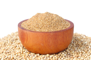 Coriander Powder in wooden bowl isolated on white background