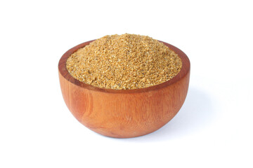 Coriander Powder in wooden bowl isolated on white background