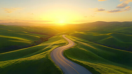 Serene winding road through lush green hills at sunset.
