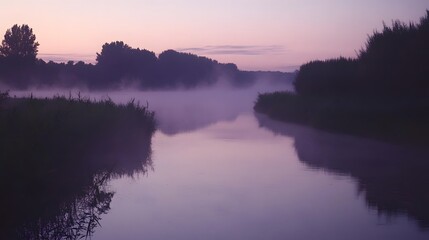 Obraz premium Tranquil River Fog at Dawn