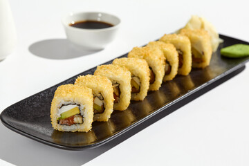 Elegant Tempura Roll with Salmon, Eel, and Avocado on Black Plate - Minimalist Food Photography