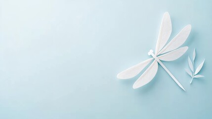 Fototapeta premium Delicate paper art of a dragonfly, white isolated background.