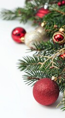 Fototapeta premium Red Christmas Ornament on a Pine Branch with White Background