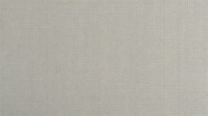Fototapeta premium close up view of a gray textured fabric background features a grid like pattern with intersecting horizontal and vertical lines, creating a subtle checkered effect