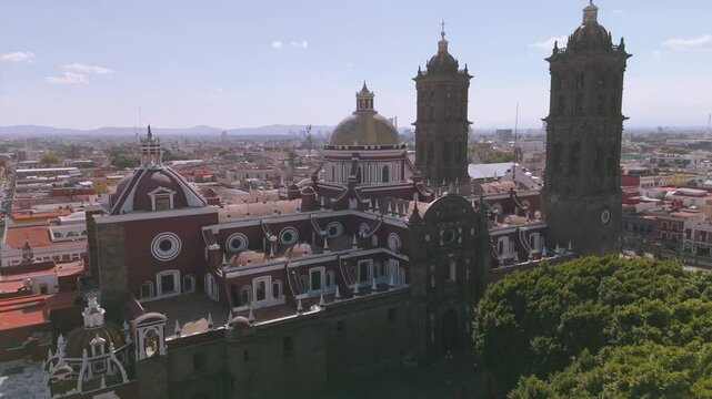 Bas&iacute;lica de Nuestra Se&ntilde;ora de la Inmaculada Concepci&oacute;n de Puebla Drone Orbit upwards reveal sunny clear day