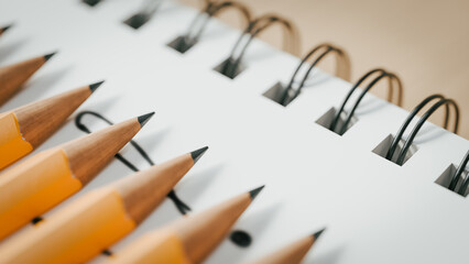 Concept background of various pencils and notebooks used while studying for exams. 3d rendering