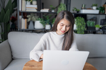 Naklejka premium Asian Businesswoman VDO Call Conference Work &nbsp;talk chat online video call on laptop webcam conference working with laptop online briefing E learning and social distancing concept