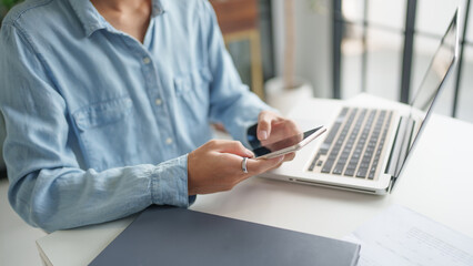 Businessman with Smartphone working mobile devices cell telephone technology e-commerce smartphone business professional investor working new start up project