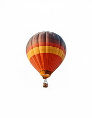 Fototapeta premium A large hot air balloon with red and yellow stripes soars against a white background.