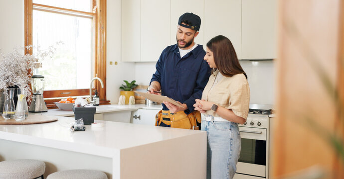 Woman, kitchen and plumber with contract on clipboard for maintenance service, information and repairs. House, discussion and man with notes in checklist for renovation, inspection or client feedback