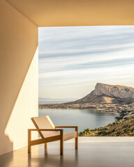 Modern chair overlooking serene lake and mountainous landscape during golden hour