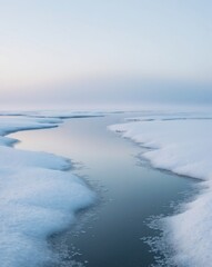 Obraz premium Serene icy landscape with tranquil reflection.