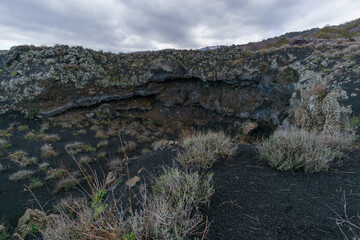 Volcanic rock formation of a cooled lava flow on Mount Etna, Catania, Sicily, Italy