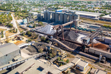 Cement plant view from above. Workshops and compressors, equipment, metallurgy. Technological work...